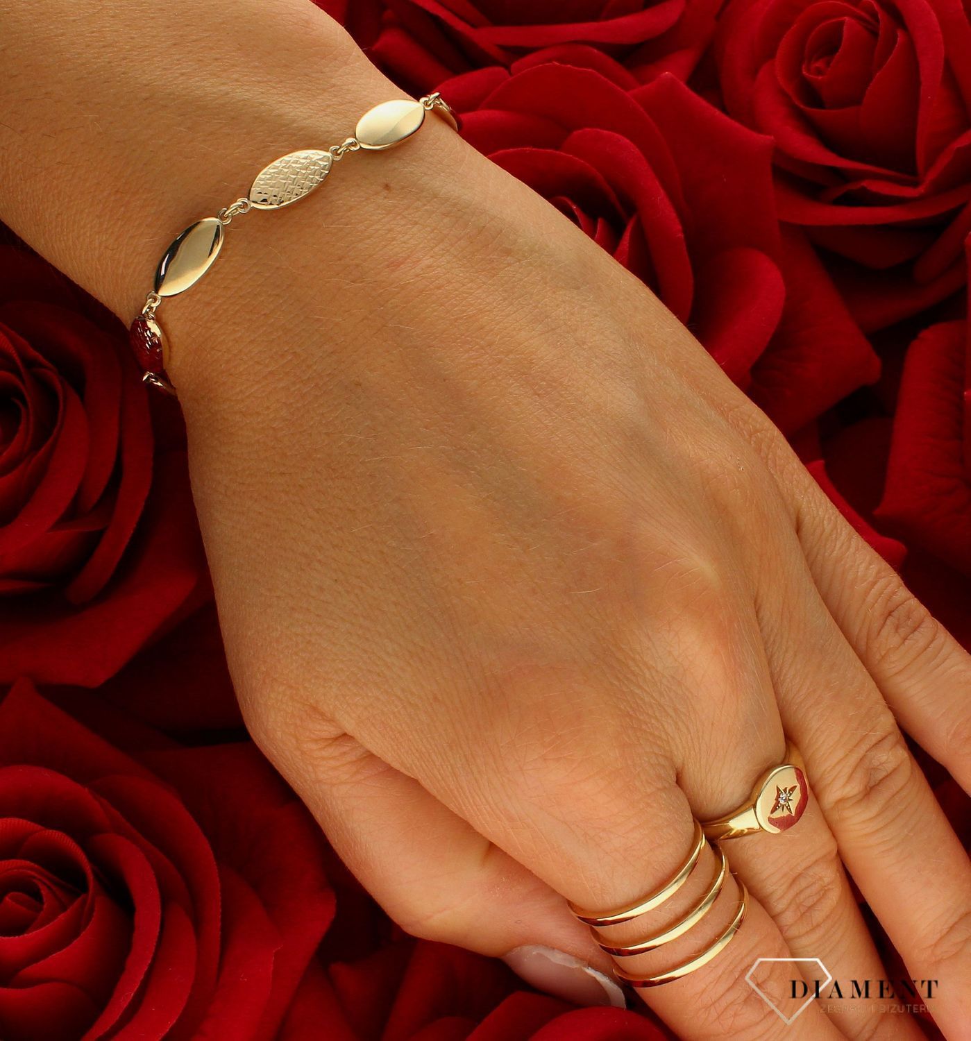 Złota bransoletka damska 375 grawerowane owalne ogniwka BR 4042 375. Bransoletka damska złota. Złota bransoletka damska. Bransoletka damska próby 375. Złota elegancka bransoletka idealna na prezent dla kobiety..jpg